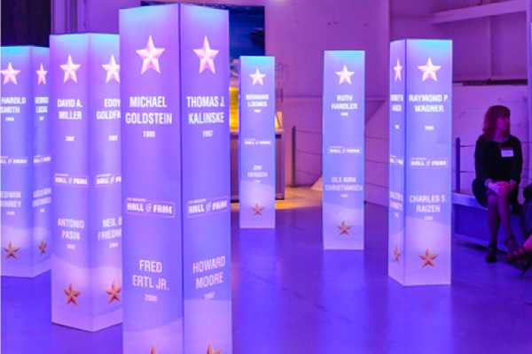 illuminated standing columns, branded for corporate events